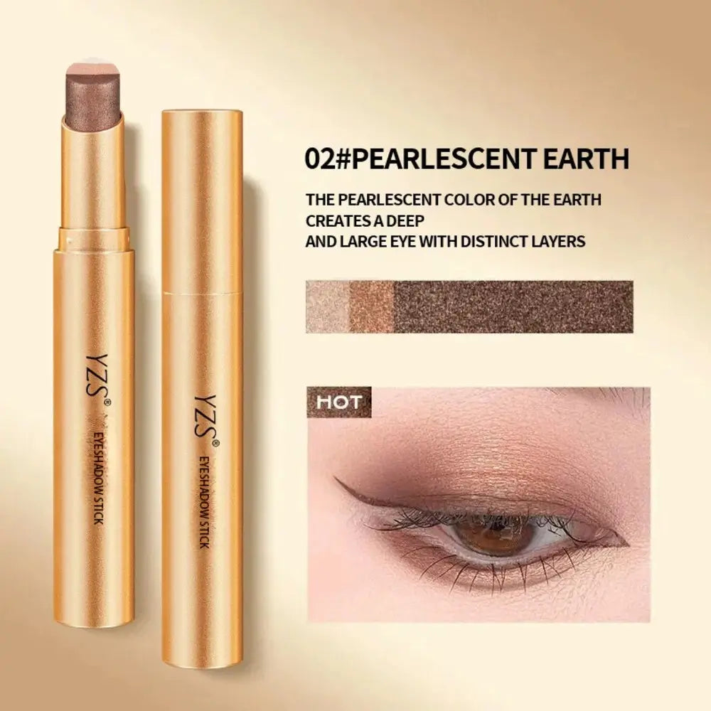 Gold eyeshadow stick shown open and closed on a beige background, with text reading '02#PEARLESCENT EARTH,' a color swatch strip, and a close-up eye wearing the shade.