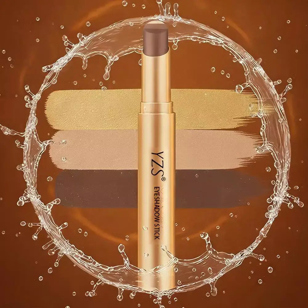 A gold makeup eyeshadow stick with a brown shade, surrounded by a water splash graphic on a brown background with three eyeshadow color swatches.