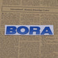 Bora - Emblem Sticker Badge, Funny Decals for Car, Truck, SUV, Motorcycle - TE032