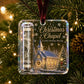 A clear square Christmas ornament hanging on a decorated Christmas tree. The ornament features a printed winter church scene with snow, trees, and the text 'Christmas Chapel' and 'A Little Christmas Blessing,' plus a rolled dollar bill sealed inside a clear tube.