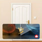 A rectangular desk mat with a sports graphic design featuring a tennis racket and ball, the text 'VS', and a red thumbs-up icon, shown placed in front of a white door in a beige hallway.
