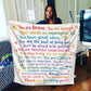 Affirmation blanket styled as a cozy throw on a sofa