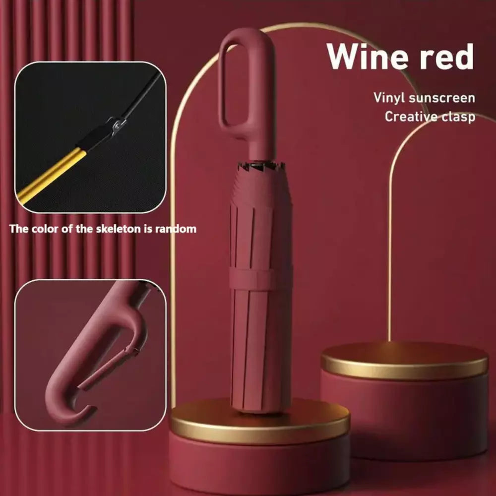 Folding travel umbrella