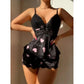 Black women's pajama set with pink heart print, lace tank top and shorts