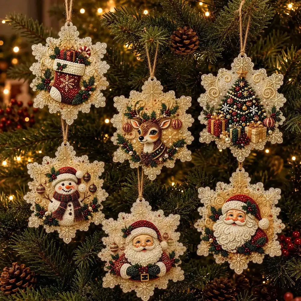 Six decorative Christmas ornaments shaped like snowflakes hang on a lit Christmas tree. The ornaments feature festive designs including a stocking, reindeer, Christmas tree, snowman, Santa Claus, and Santa face, all in warm cream, red, green, and gold tones.