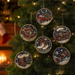 Five round Christmas bead ornaments hanging on a decorated evergreen tree. The ornaments feature holiday scenes including a red pickup truck carrying a Christmas tree, Santa Claus in a sleigh with gifts, a red Christmas train, a pair of white ice skates, and a snowboarder in a snowy landscape.