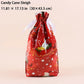 A red Christmas-themed candy cane bag with a printed candy cane in a sleigh, white snowflakes, and a white drawstring tie at the top. Text at the top left reads 'Candy Cane Sleigh