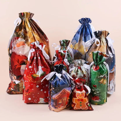 A set of Christmas-themed drawstring gift bags in various sizes, featuring festive holiday prints including Santa Claus, snowflakes, gingerbread men, and winter scenes, tied with white ribbons against a solid beige background.