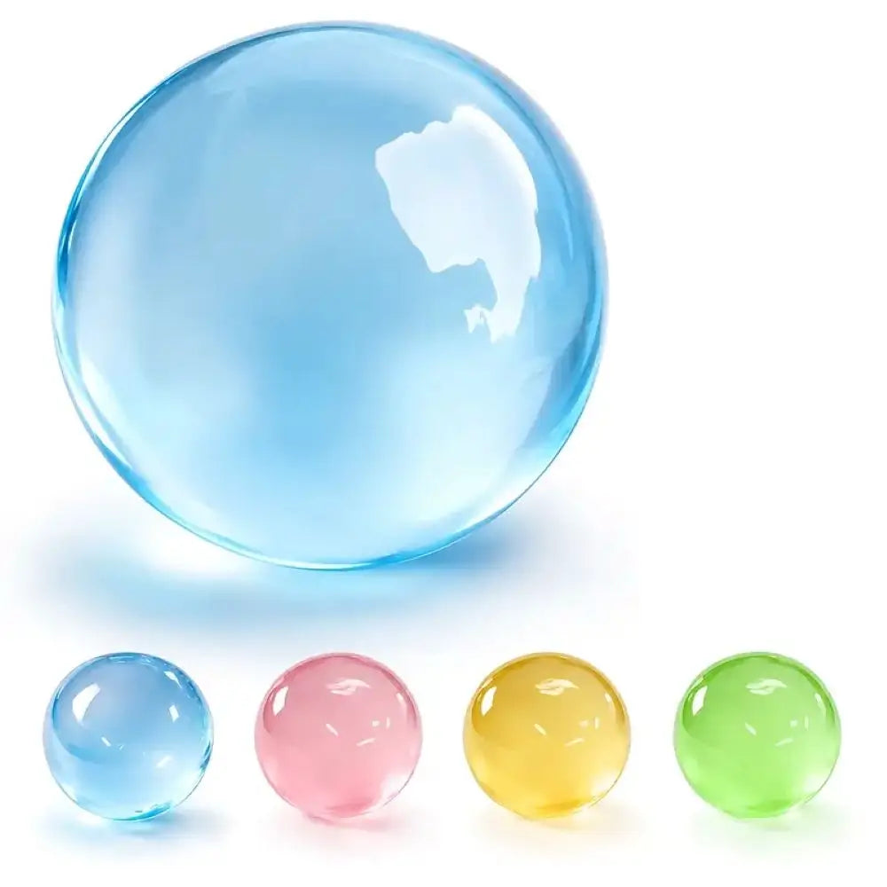A large translucent light blue glass sphere shown above four smaller colored glass spheres in blue, pink, yellow, and green on a white background.