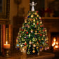 Finished beaded Christmas tree displayed as a festive tabletop decoration