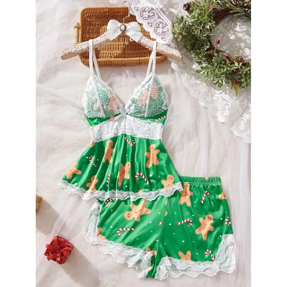 Green women's pajama set with gingerbread and candy cane print