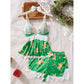 Green women's pajama set with gingerbread and candy cane print
