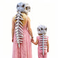 A woman and a child shown from behind wearing matching pink skeleton costume outfits with plush skull headpieces and backbone back covers, holding hands against a plain white background.