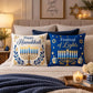 Hanukkah decorative pillow covers styled on a bed