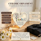 Heart-shaped ceramic keepsake ornament displayed on a wooden surface with a necklace, surrounded by daisies, fairy lights, a gift box, and informational text bubbles describing product features.