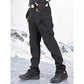Men's tactical pants worn for hiking in cool weather