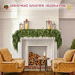 Living room with Christmas decorations including a fireplace, garland, and candles.