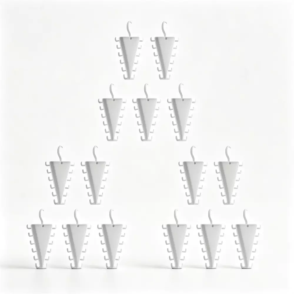 A set of white, cone-shaped novelty candles arranged in a pyramid pattern against a solid white background.