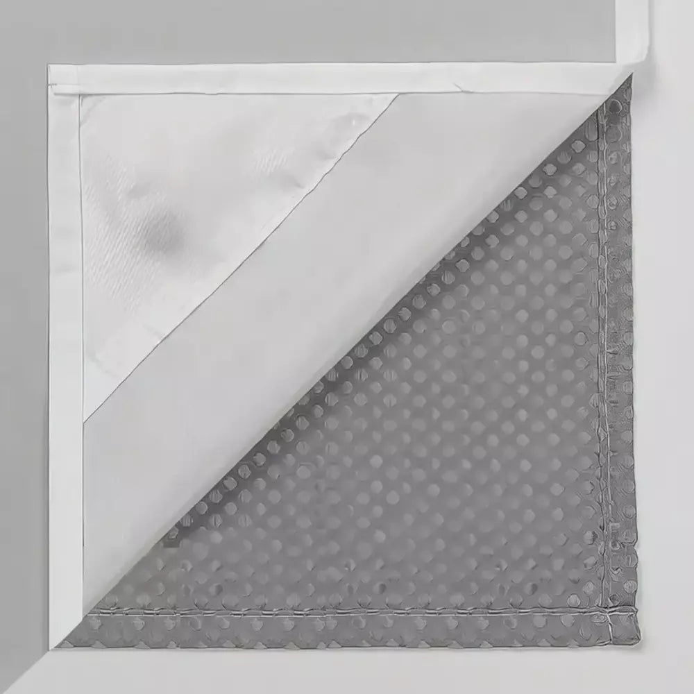 Close-up of the textured polyester fabric on the waffle shower curtain