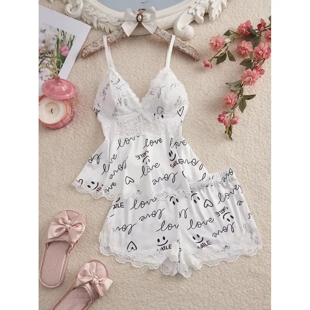 White women's pajama set with love lettering, heart and smiley print