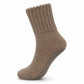 A single taupe brown ribbed ankle sock with gray grip dots on the sole, shown against a plain white background.