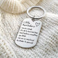 Front view of the You Are Enough motivational keychain